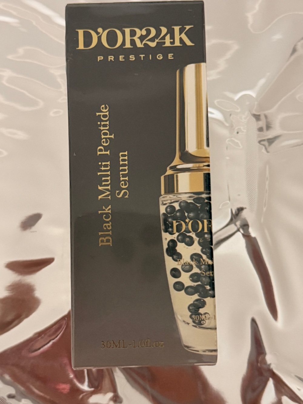 D'OR24K Prestige Black Multi Peptide Serum — Black & Gold